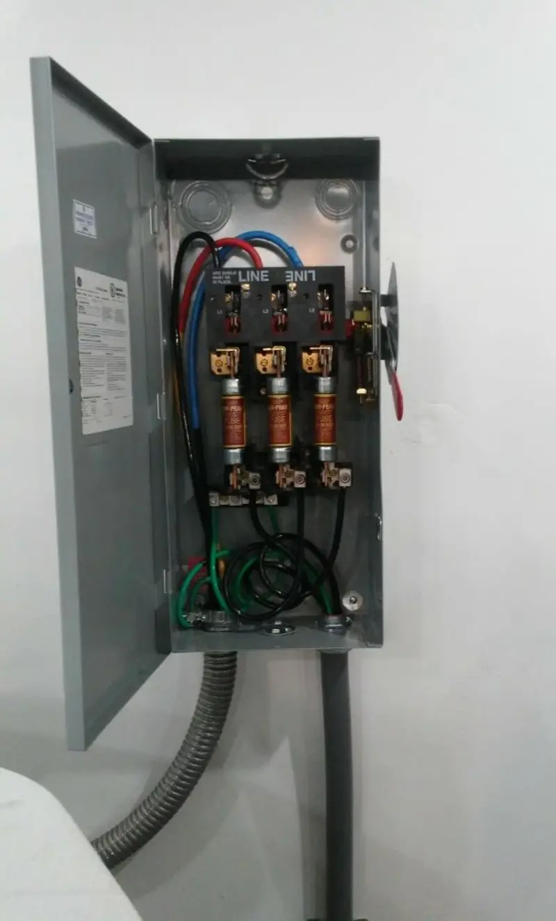 Three-phase disconnect switch installed for Smoke Detector Installation in Cameron